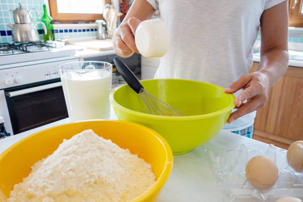 istock Woman preparing pancake batter 1274831738