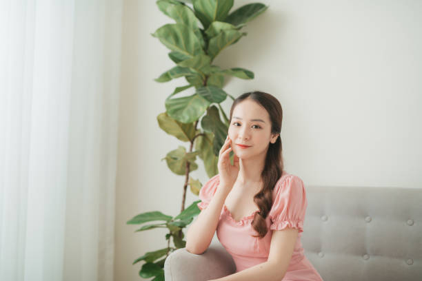 istock young attractive asian woman relaxing 1274838906