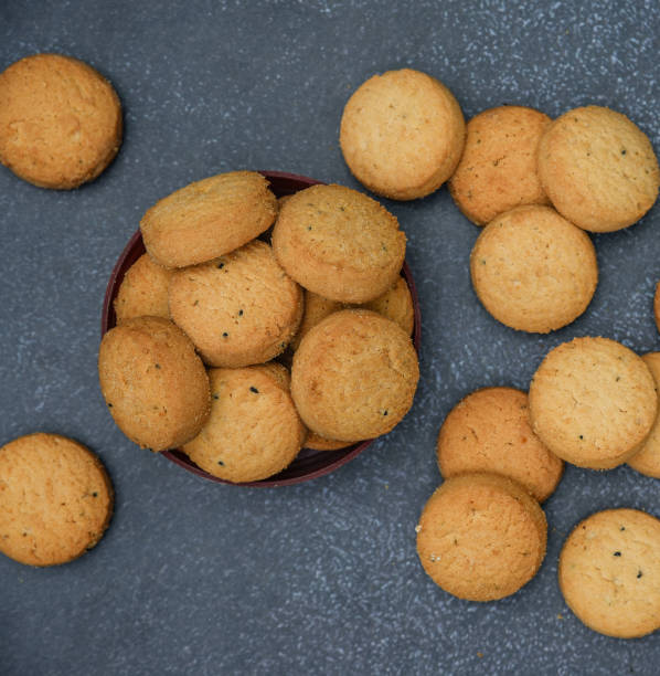 biscuits isolated on dark background.Atta biscuit, cookies, white flour biscuit - Indian cooking