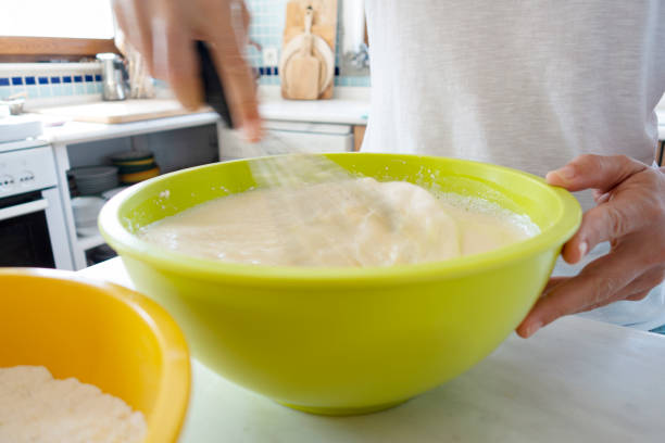 Woman preparing pancake batter
