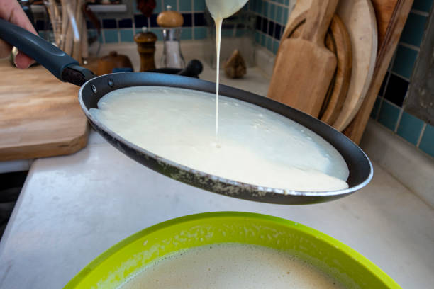 istock Woman Preparing Crepes 1274853227