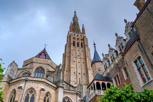 Exterior view of the Church of Sint-Jans (Saint John) in Bruges This temple was part of a 12th century medieval hospital, built and run by monks of the order of the Hospital, where sick pilgrims were cared for. Today, the hospital's premises house an important museum of the city, whose collection includes six paintings by Hans Memling.