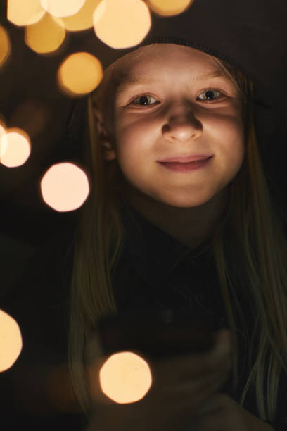 istock Girl Lit by Lights at Night 1274885759