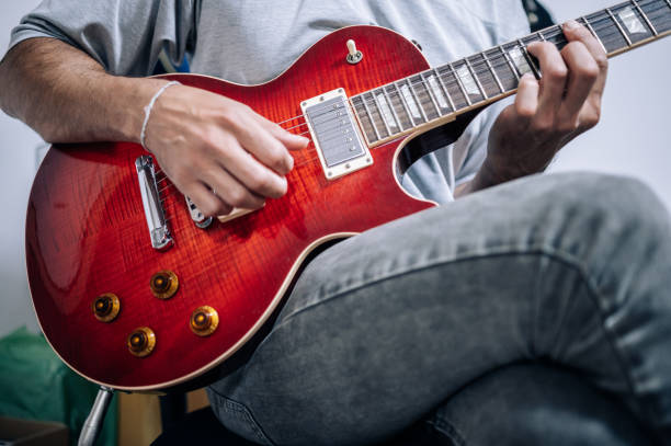 istock Professional musician practicing at home. Problem of concert cancellation during the Covid-19 pandemic.Music and professional musicians concept 1274898648