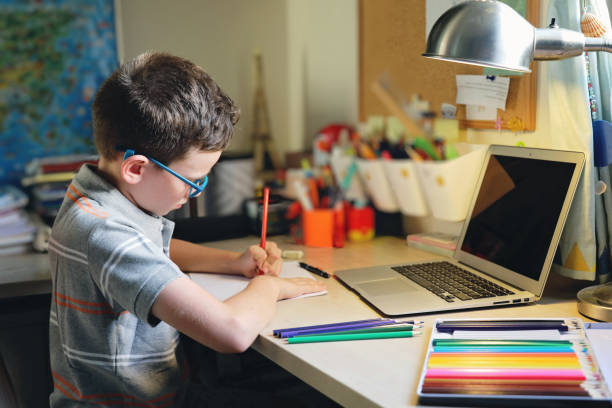 istock Home schooling distance learning child online education 1274901699