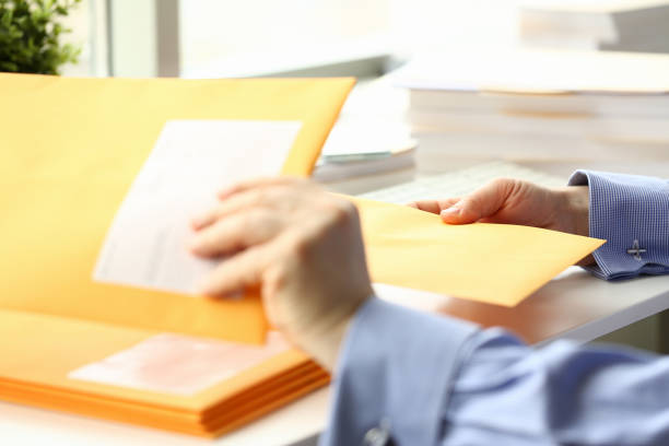 istock Focused photo on male hand that taking envelope 1274928970