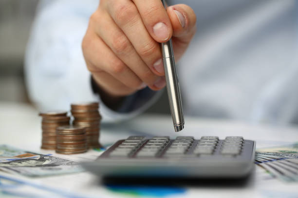 istock Focused photo on hand that holding silver pen 1274929072