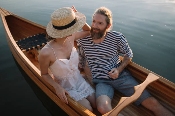 istock Romantic couple relaxing in boat 1274948543