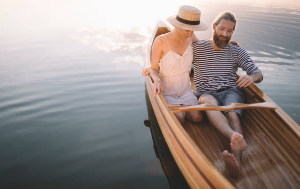 istock Romantic couple relaxing in boat 1274948676
