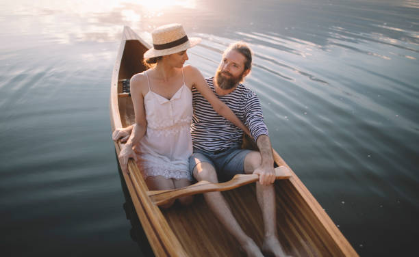 istock Romantic couple relaxing in boat 1274948713