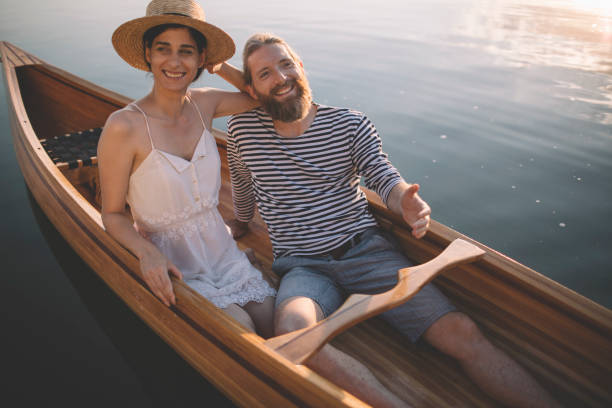 istock Romantic couple relaxing in boat 1274948999