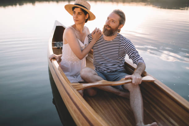 istock Romantic couple relaxing in boat 1274950481