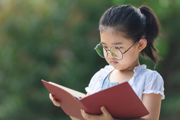 istock Little girl with glasses 1274979019