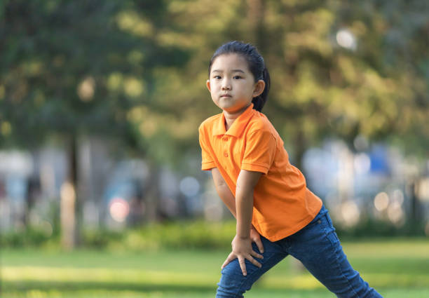 istock Cute Little Girl Hands on Knee 1274979251