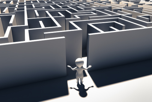 3D Comic Man in front of a large Maze