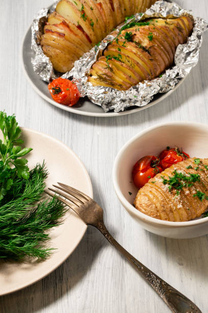 istock Baked potatoes with parmesan cheese and bacon 1275034624