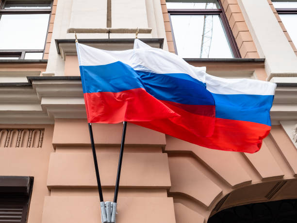 istock pair of state Russian flags are fluttering in wind 1275039659