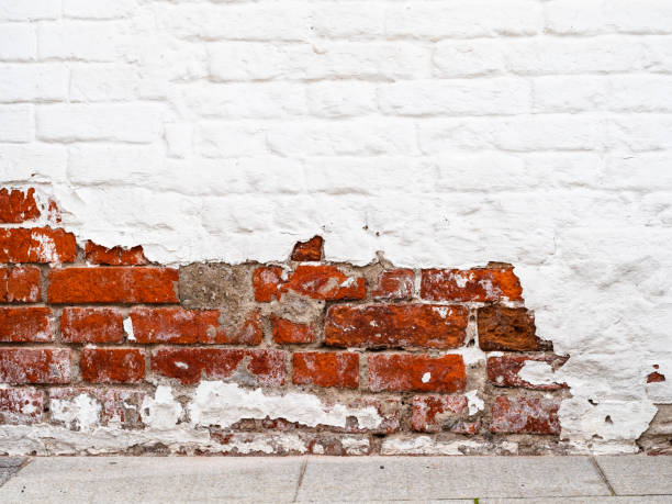 istock shabby red and white painted brick wall 1275039677