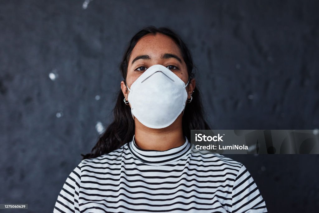 Until it's solved, society will slowly suffocate Studio shot of a young woman wearing a mask with “I can’t breathe” in protest against racism 20-29 Years Stock Photo