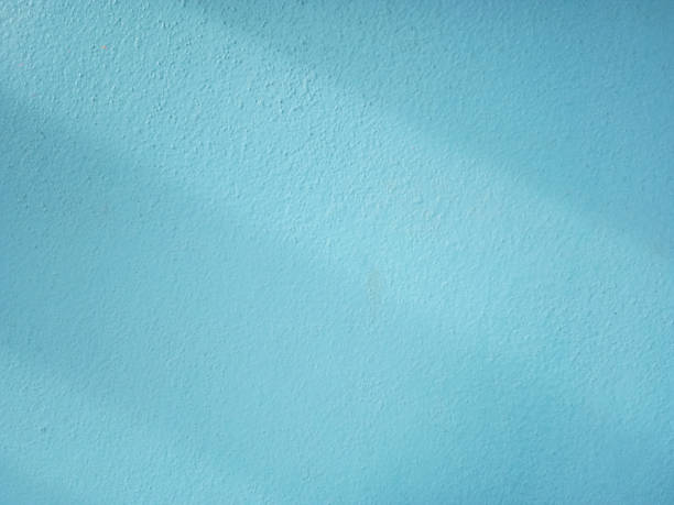 istock Smooth surface blue cement wall background in vintage style for graphic design 1275060641