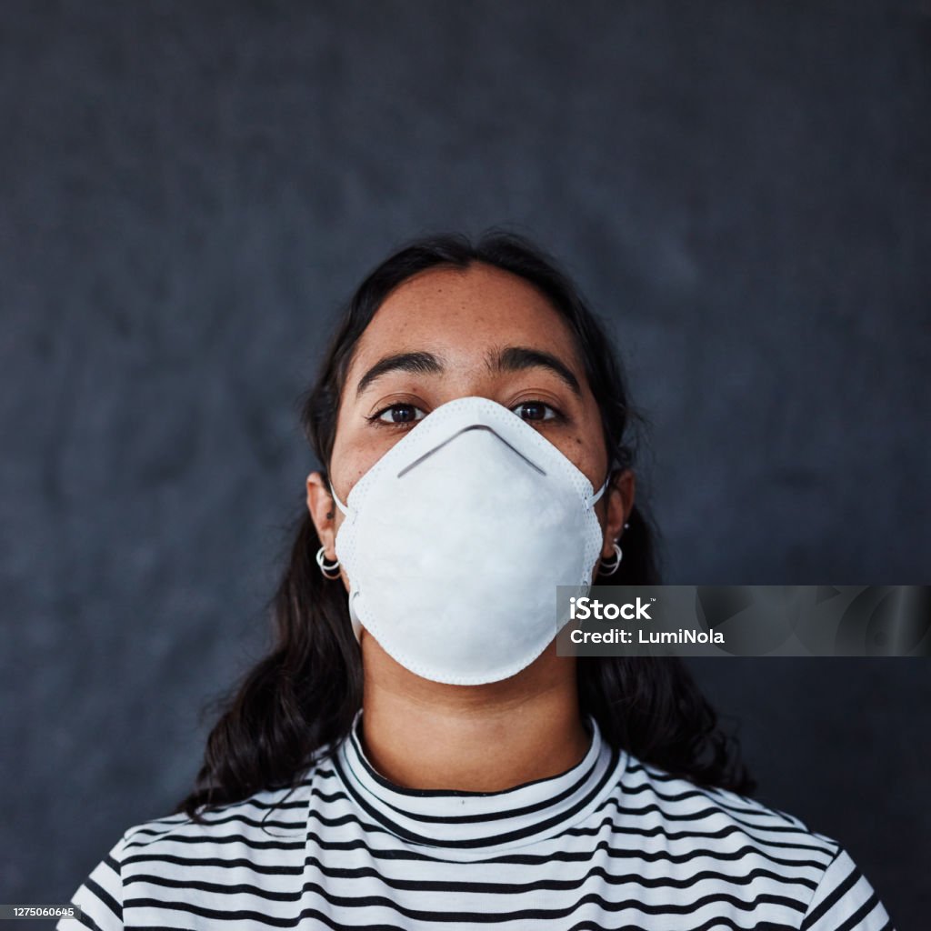 Will my life be cut short too? Studio shot of a young woman wearing a mask with “I can’t breathe” in protest against racism 20-29 Years Stock Photo
