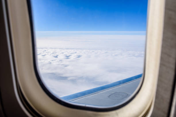 istock View on white clouds from the airplane window 1275071576