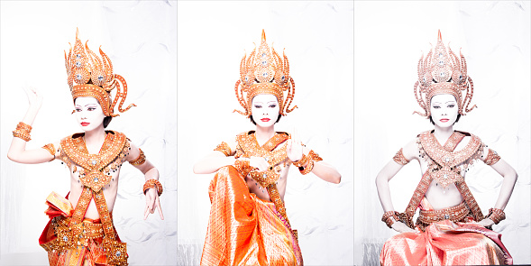 Vintage Dress of Thai, Cambodia, Myanmar Traditional Costume or Ancient Asia gold Cloth for Goddess in Asian beautiful Woman with decorative crown necklace over White background