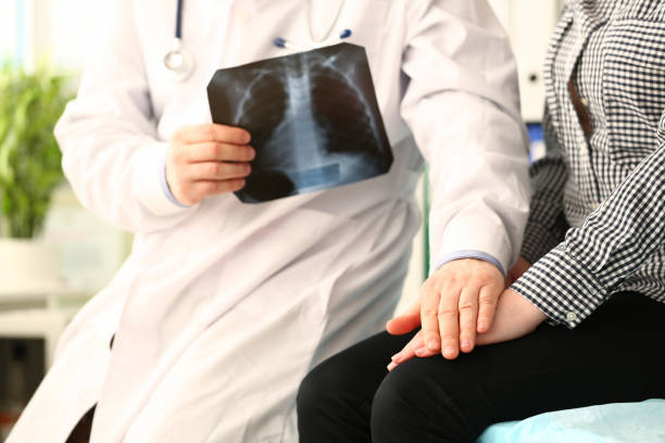 istock Competent medical worker supporting his young patient 1275081530