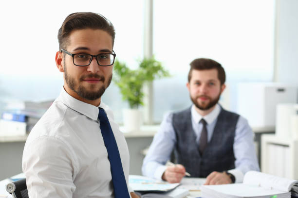 istock Handsome bearded man looking straight at camera 1275081652