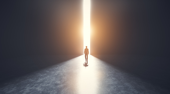 Businessman walking towards an open big gate of light. Concept of hope, new better world, bright future. 3D illustration
