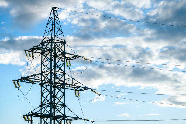istock Power Transmission Line high vottage electric transmission line with sky background 1275104087