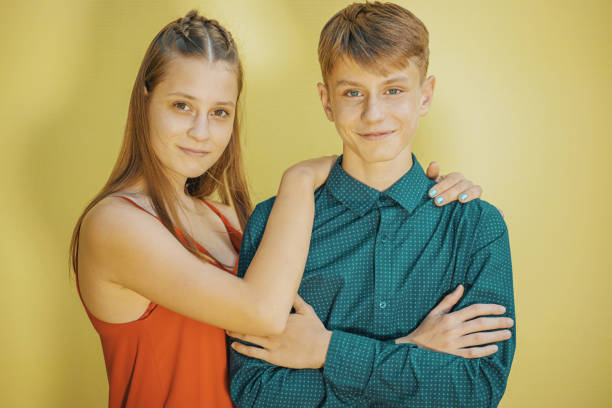 istock young couple on a romantic date against a yellow wall 1275104164