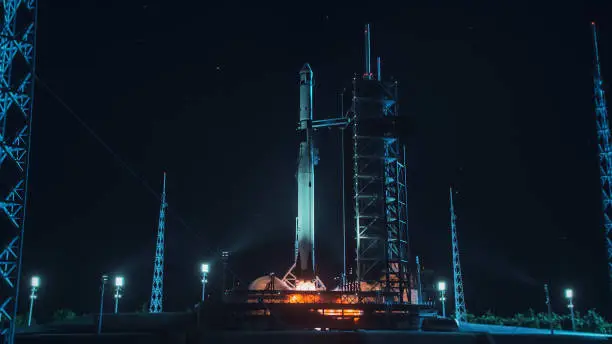 Photo of Launch Pad Complex: Successful Rocket Launching with Crew on a Space Exploration Mission. Flying Spaceship Blasts Flames and Smoke on a Take-Off. Humanity in Space, Conquering Universe