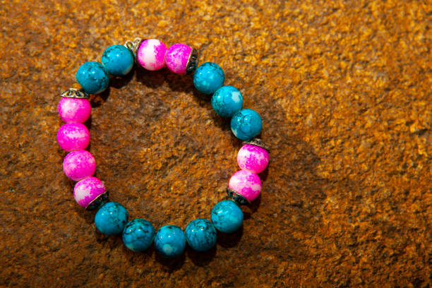 istock image of bracelet stone background 1275108603