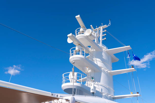 istock Communication antennas with navigation equipment, radar on the upper deck of the luxury white cruise ship. 1275114847