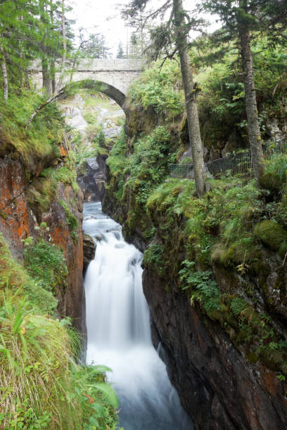 istock Waterfall flowing under Pont d'Espagne, Cauterets, Pyrenees, France 1275124576