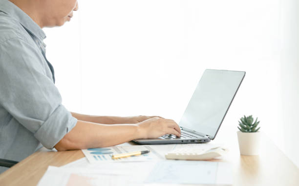 istock Concentrated Businessman is working on Laptop computer.Business concept. 1275125342