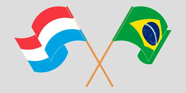 Vector illustration of Crossed and waving flags of Luxembourg and Brazil
