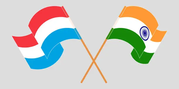 Vector illustration of Crossed and waving flags of Luxembourg and India