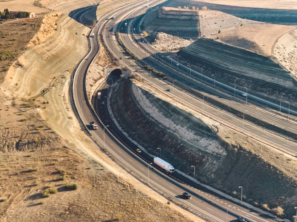 istock High Angle View Of Road Passing Through Land 1275148598