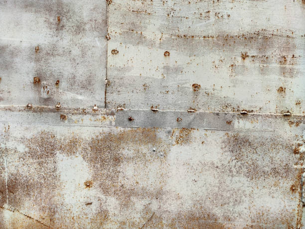 istock Rusty metal background with streaks of rust. Corroded metal background. Rust stains. Rystycorrosion. 1275171713