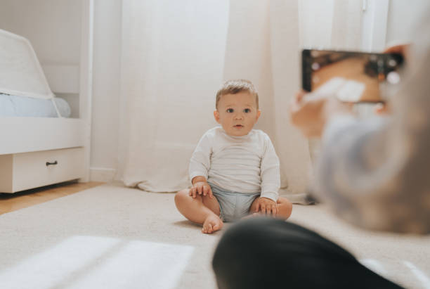 istock Baby crawling for the first time 1275172557