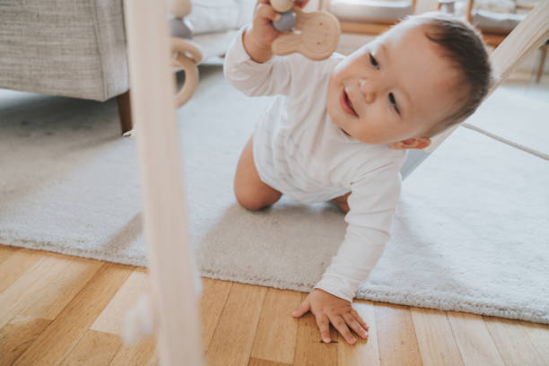 istock Baby crawling for the first time 1275174951