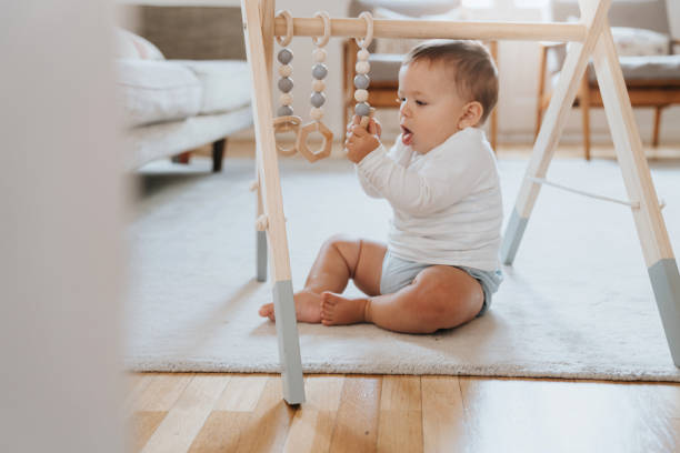 istock Baby crawling for the first time 1275174993