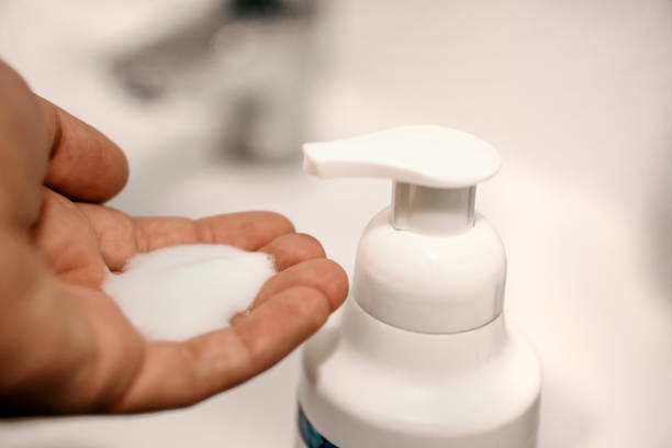 istock washing hands with foam liquid soap 1275175804