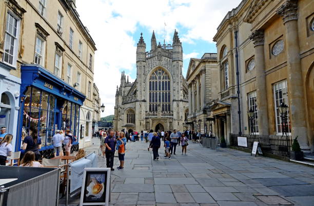 Bath, UK - July 04, 2015: street view of Bath, with unidentified people. Bath is known for the curative Roman-built baths that still exist there and is is a UNESCO world heritage site since 1987