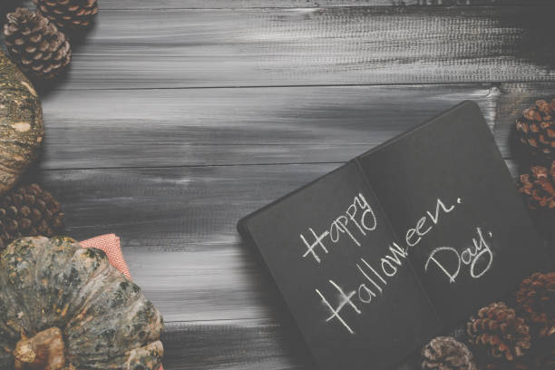 istock Halloween background with pumpkins isolated on dark background. Copy space for text. Festive concept. 1275186007