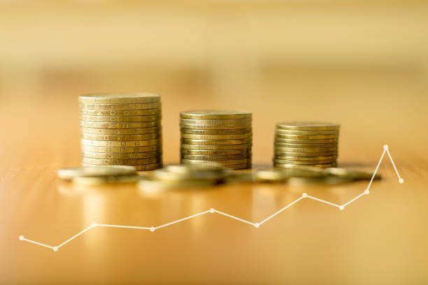 istock Save money concept, stacks of coins close up 1275191478