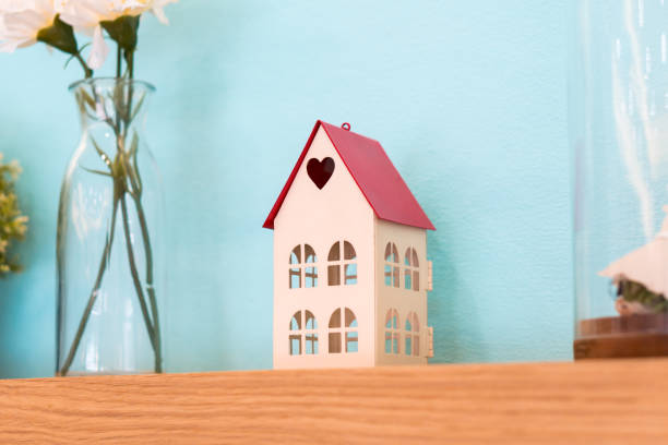 istock Small house toy with heart shape 1275198438