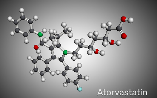 Atorvastatin, statin molecule. It is used for lowering blood cholesterol and for preventing cardiovascular diseases. Molecular model. 3D rendering
